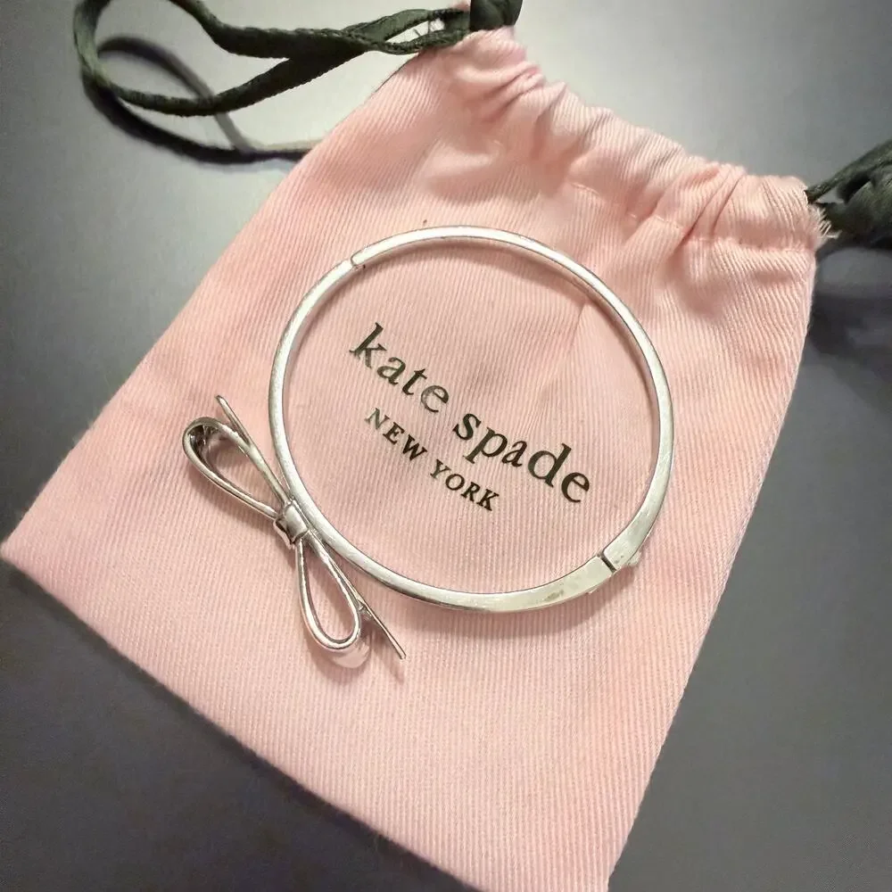 Kate Spade Love Notes Silver Tone Large Bow Hinge Bracelet